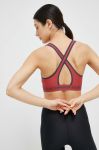 Спортивний бюстгальтер Under Armour Crossback колір червоний однотонний 1361034-001 Спортивний бюстгальтер Under Armour Crossback колір червоний однотонний 1361034-001