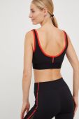 Спортивний бюстгальтер Puma X Vogue колір чорний однотонний Спортивний бюстгальтер Puma X Vogue колір чорний однотонний