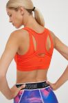 Спортивний бюстгальтер P.E Nation Rudimental колір помаранчевий однотонний Спортивний бюстгальтер P.E Nation Rudimental колір помаранчевий однотонний