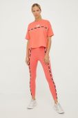 Легінси Puma Power Tape жіночі колір помаранчевий з аплікацією Легінси Puma Power Tape жіночі колір помаранчевий з аплікацією