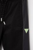 Дитячі спортивні штани Guess колір чорний візерунок (2482536)