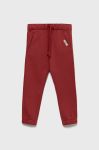 Дитячі бавовняні штани United Colors of Benetton колір бордовий однотонні Дитячі бавовняні штани United Colors of Benetton колір бордовий однотонні
