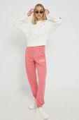 Спортивні штани Fila жіночі колір помаранчевий з аплікацією Спортивні штани Fila жіночі колір помаранчевий з аплікацією