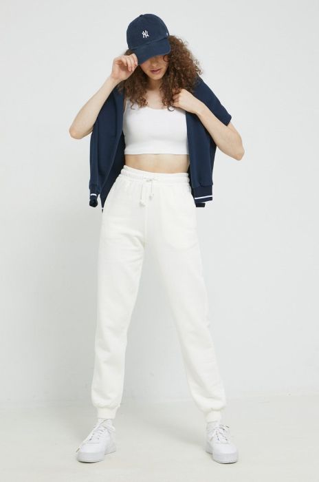 Спортивні штани Fila жіночі колір бежевий однотонні (2613854) Спортивні штани Fila жіночі колір бежевий однотонні (2613854)