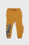 Дитячі спортивні штани Name it Park Jurajski колір жовтий з принтом Дитячі спортивні штани Name it Park Jurajski колір жовтий з принтом