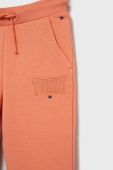 Дитячі спортивні штани Tommy Hilfiger колір помаранчевий з аплікацією Дитячі спортивні штани Tommy Hilfiger колір помаранчевий з аплікацією