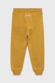 Дитячі бавовняні штани United Colors of Benetton колір жовтий однотонні (2737036)