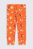Дитячі спортивні штани Coccodrillo колір помаранчевий візерунок