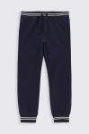 Дитячі бавовняні штани Coccodrillo колір синій однотонні (2758721) Дитячі бавовняні штани Coccodrillo колір синій однотонні (2758721)
