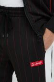 Спортивні штани Puma Puma X Coca Cola чоловічі колір чорний візерунок