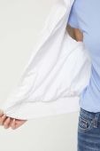 Куртка Tommy Jeans жіноча колір білий зимова oversize (3369602) Куртка Tommy Jeans жіноча колір білий зимова oversize (3369602)