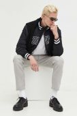 Куртка-бомбер Tommy Jeans чоловічий колір чорний перехідна Куртка-бомбер Tommy Jeans чоловічий колір чорний перехідна