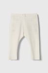Дитячі бавовняні легінси United Colors of Benetton колір бежевий візерунок Дитячі бавовняні легінси United Colors of Benetton колір бежевий візерунок
