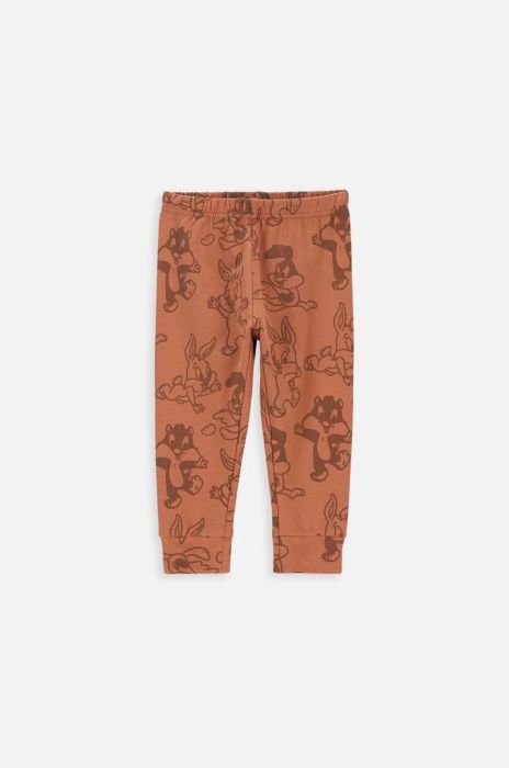 Дитячі спортивні штани Coccodrillo x Loonet Tunes колір коричневий візерунок Дитячі спортивні штани Coccodrillo x Loonet Tunes колір коричневий візерунок