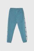 Дитячі спортивні штани Guess з принтом колір блакитний Дитячі спортивні штани Guess з принтом колір блакитний