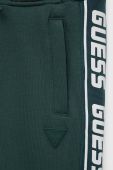 Дитячі спортивні штани Guess колір зелений з принтом Дитячі спортивні штани Guess колір зелений з принтом