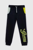 Дитячі бавовняні штани Guess колір синій візерунок (3296874)