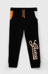 Дитячі бавовняні штани Guess колір чорний візерунок (3296881) Дитячі бавовняні штани Guess колір чорний візерунок (3296881)