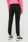 Спортивні штани Hummel колір чорний однотонні Спортивні штани Hummel колір чорний однотонні
