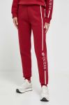Спортивні штани Guess колір червоний з аплікацією Спортивні штани Guess колір червоний з аплікацією