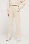 Спортивні штани Ellesse колір бежевий візерунок Спортивні штани Ellesse колір бежевий візерунок