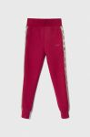 Дитячі спортивні штани Guess колір бордовий візерунок Дитячі спортивні штани Guess колір бордовий візерунок