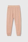 Дитячі спортивні штани Guess колір рожевий візерунок Дитячі спортивні штани Guess колір рожевий візерунок