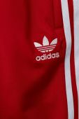 Дитячі спортивні штани adidas Originals колір червоний візерунок