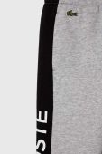 Дитячі спортивні штани Lacoste колір сірий візерунок