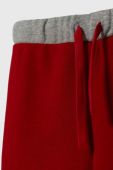 Дитячі спортивні штани United Colors of Benetton колір червоний візерунок Дитячі спортивні штани United Colors of Benetton колір червоний візерунок