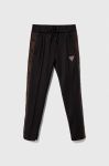 Дитячі спортивні штани Guess колір чорний з аплікацією (3603018) Дитячі спортивні штани Guess колір чорний з аплікацією (3603018)
