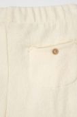Дитячі спортивні штани United Colors of Benetton колір бежевий меланж
