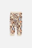 Дитячі спортивні штани Coccodrillo колір бежевий візерунок (3642297)