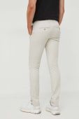 Штани Tommy Hilfiger чоловічі колір бежевий облягаюче