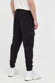 Бавовняні спортивні штани Tommy Jeans колір чорний меланж