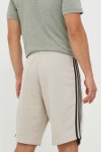 Бавовняні шорти adidas Originals колір бежевий
