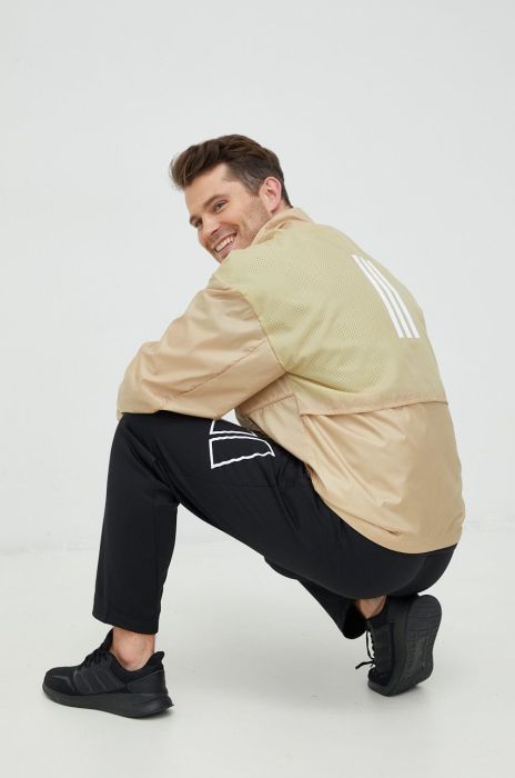 Вітровка adidas Performance колір бежевий перехідна Вітровка adidas Performance колір бежевий перехідна