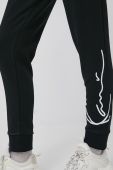 Штани Karl Kani жіночі колір чорний з аплікацією Штани Karl Kani жіночі колір чорний з аплікацією