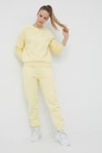 Спортивні штани Peak Performance жіночі колір жовтий однотонні