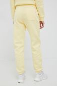 Спортивні штани Peak Performance жіночі колір жовтий однотонні