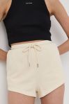 Бавовняні шорти Young Poets Society жіночі колір бежевий однотонні висока посадка Бавовняні шорти Young Poets Society жіночі колір бежевий однотонні висока посадка