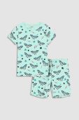 Дитяча бавовняна піжама Coccodrillo X Wonder Woman колір бірюзовий візерунок