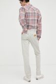 Штани Wrangler Larston чоловічі колір бежевий облягаюче