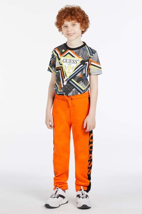 Дитячі бавовняні штани Guess колір помаранчевий з аплікацією (2856688) Дитячі бавовняні штани Guess колір помаранчевий з аплікацією (2856688)