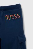 Дитячі бавовняні штани Guess колір синій однотонні (3053002) Дитячі бавовняні штани Guess колір синій однотонні (3053002)
