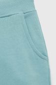 Дитячі бавовняні штани Guess колір бірюзовий однотонні (3136287) Дитячі бавовняні штани Guess колір бірюзовий однотонні (3136287)
