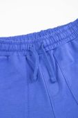 Дитячі бавовняні штани Coccodrillo колір синій однотонні (3191457) Дитячі бавовняні штани Coccodrillo колір синій однотонні (3191457)