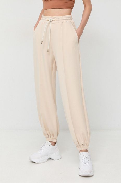 Спортивні штани BOSS жіночі колір бежевий однотонні Спортивні штани BOSS жіночі колір бежевий однотонні