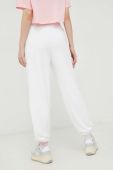 Спортивні штани Tommy Jeans жіночі колір білий з аплікацією