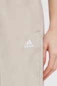 Бавовняні штани adidas жіночі колір бежевий однотонні